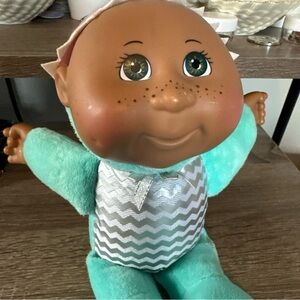 Adorable Plush Baby Doll with Green Outfit